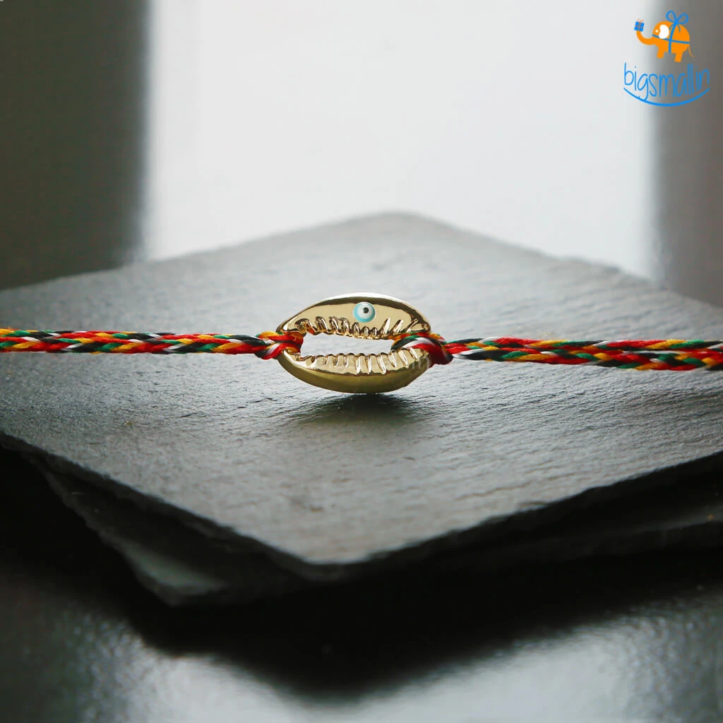 DesignWesign All Of It Evil Eye Conch Shell Rakhi